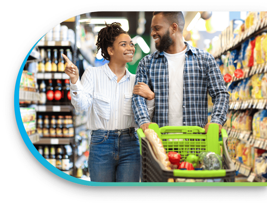 a couple shopping in a grocery store